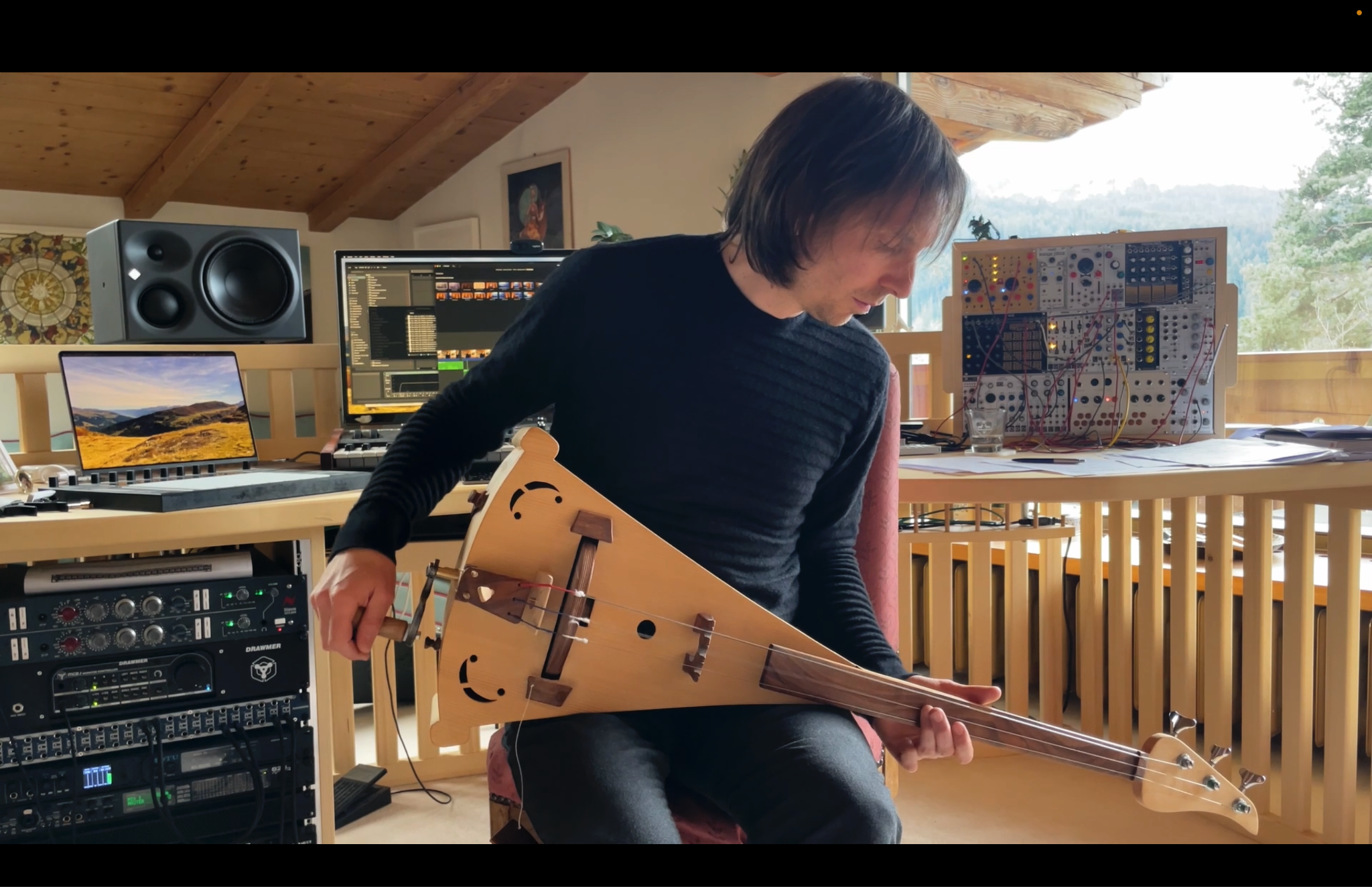 The bass hurdy gurdy was built by Karl Riedel. The instrument is a cross between a hurdy gurdy and a cello.